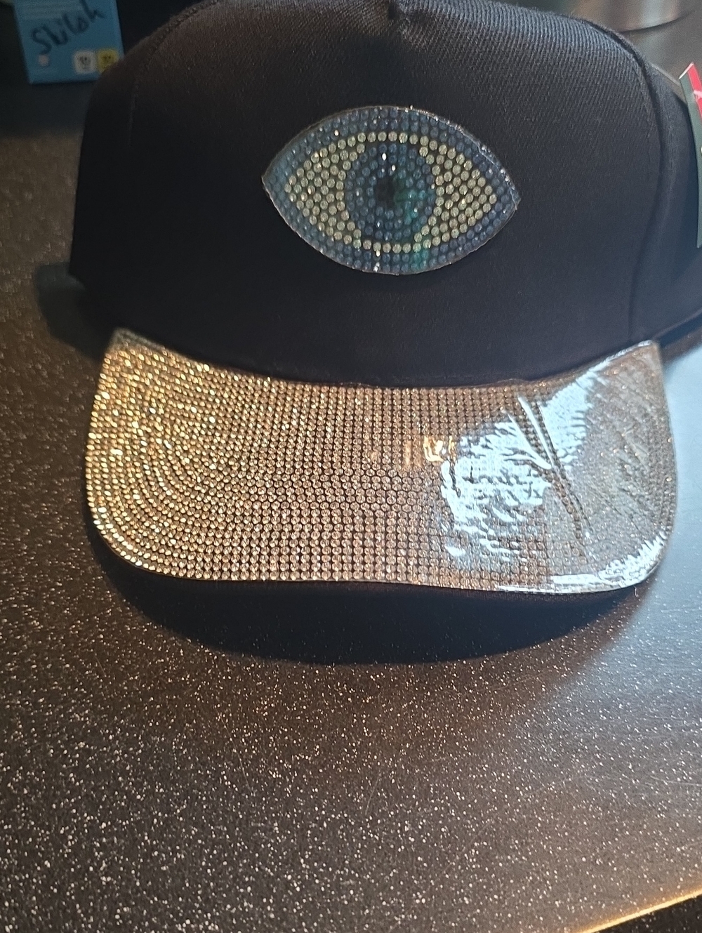 Black Rhinestone Visor Cap with Blue Eye Accent
